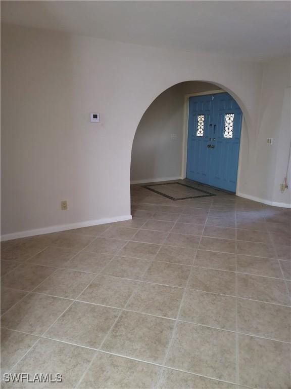 entryway featuring light tile patterned floors