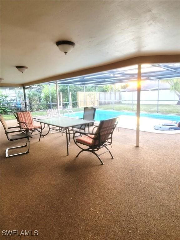 unfurnished sunroom with vaulted ceiling