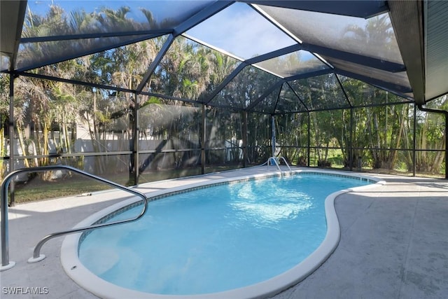 view of pool featuring a lanai and a patio area