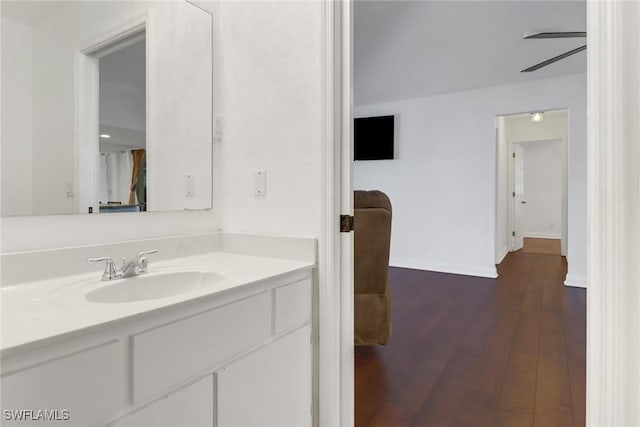 bathroom featuring vanity and hardwood / wood-style flooring