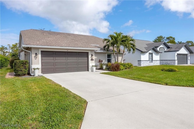 ranch-style house with a garage and a front lawn