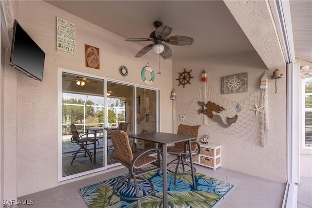 view of patio / terrace featuring ceiling fan