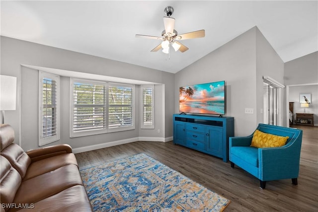 living room with ceiling fan, dark wood-type flooring, and vaulted ceiling