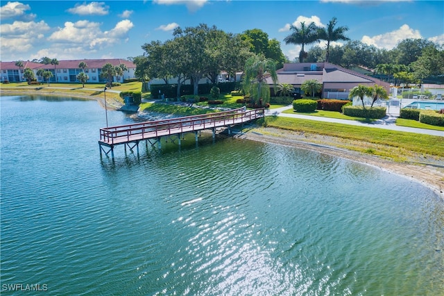 exterior space with a water view