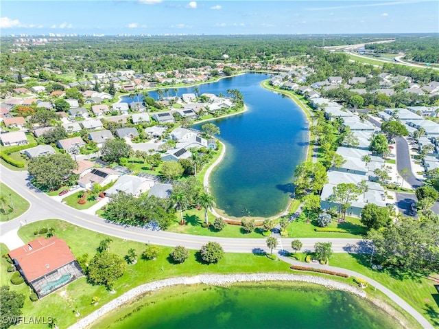 drone / aerial view with a water view