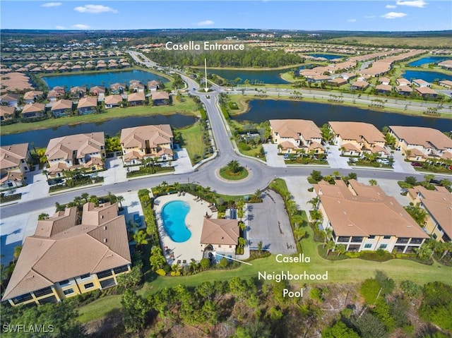 birds eye view of property featuring a water view