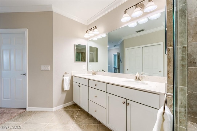 bathroom featuring tile patterned floors, vanity, and crown molding