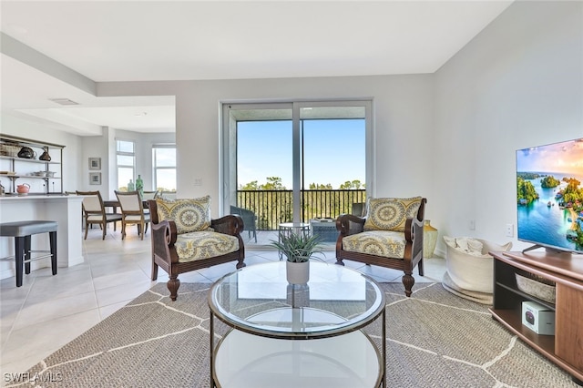 living room featuring light tile patterned floors