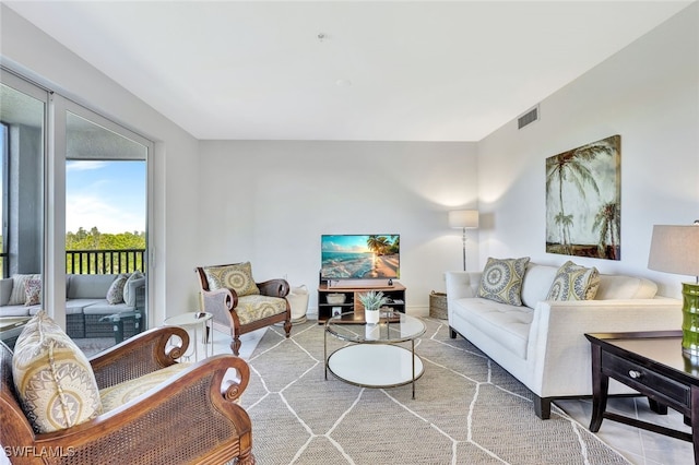 living room featuring light tile patterned flooring