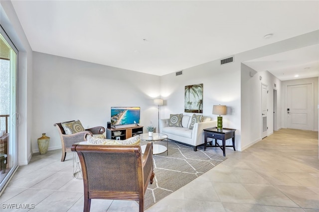 living room featuring light tile patterned floors