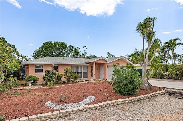 single story home with a garage