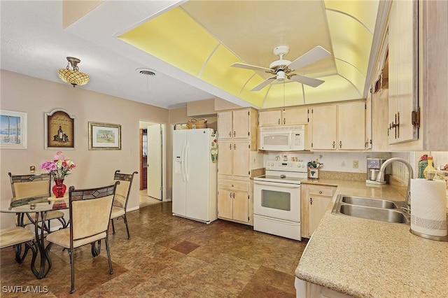 kitchen with ceiling fan, sink, and white appliances