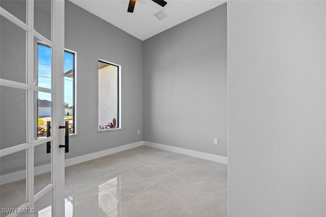 spare room featuring ceiling fan