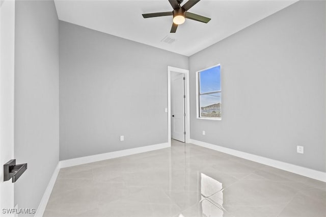 empty room featuring ceiling fan