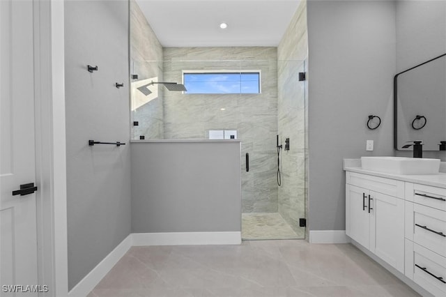 bathroom with vanity and walk in shower