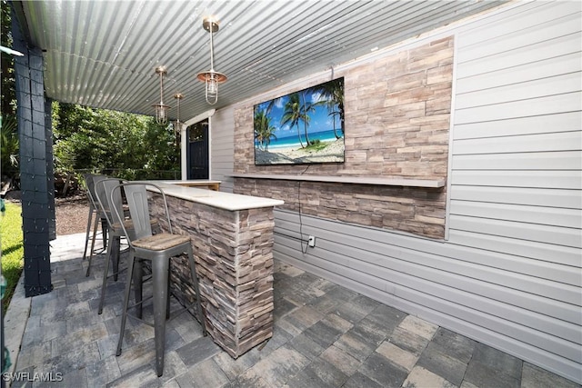 view of patio / terrace with an outdoor bar