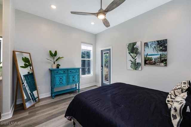 bedroom featuring hardwood / wood-style flooring and ceiling fan