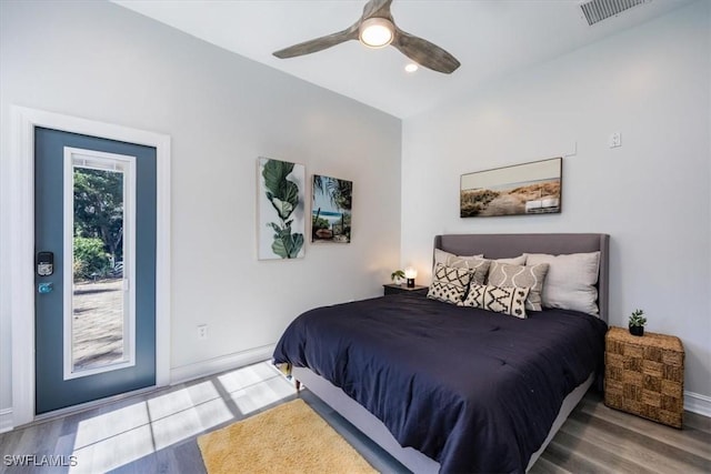 bedroom featuring wood-type flooring and ceiling fan