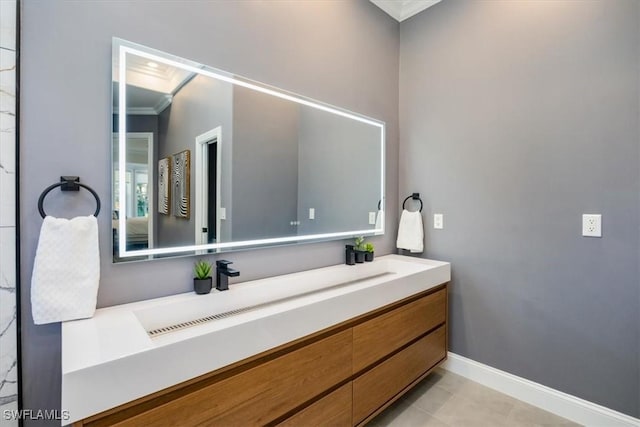 bathroom featuring vanity and crown molding