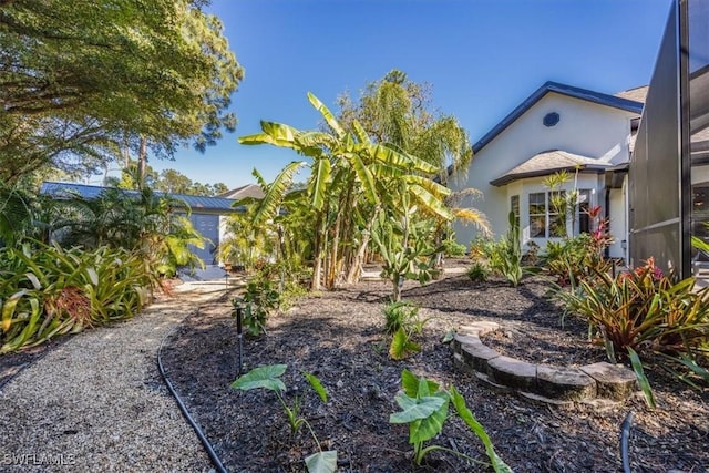 view of yard featuring a lanai