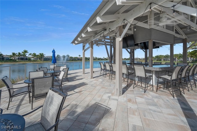 view of patio featuring a water view