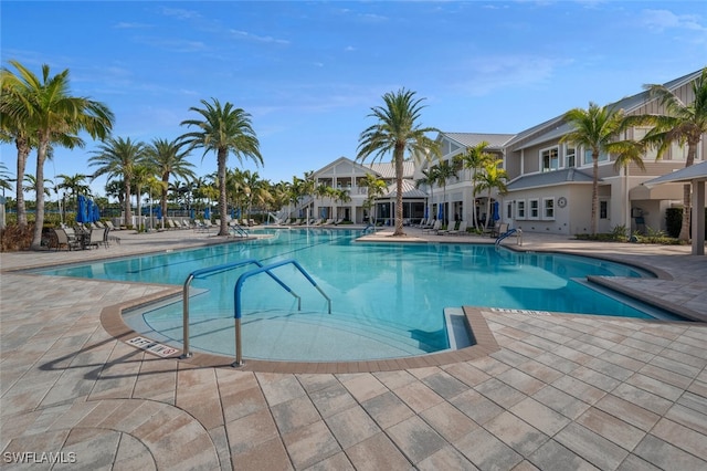 view of swimming pool with a patio area