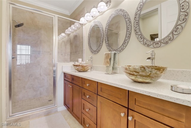 bathroom with vanity, tile patterned floors, walk in shower, and ornamental molding