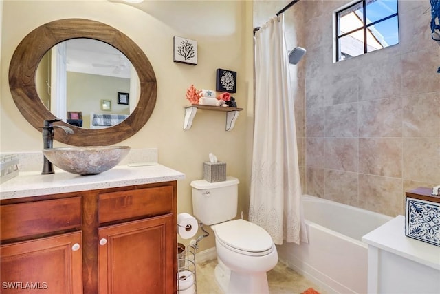 full bathroom with shower / bath combo, vanity, toilet, and tile patterned floors