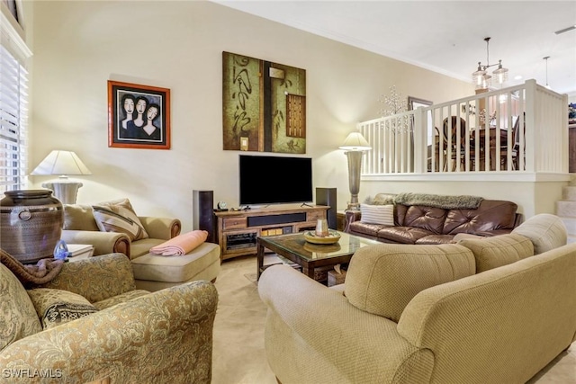 living room featuring crown molding