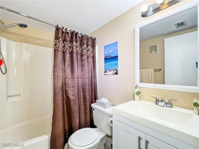 full bathroom with shower / tub combo, vanity, and toilet