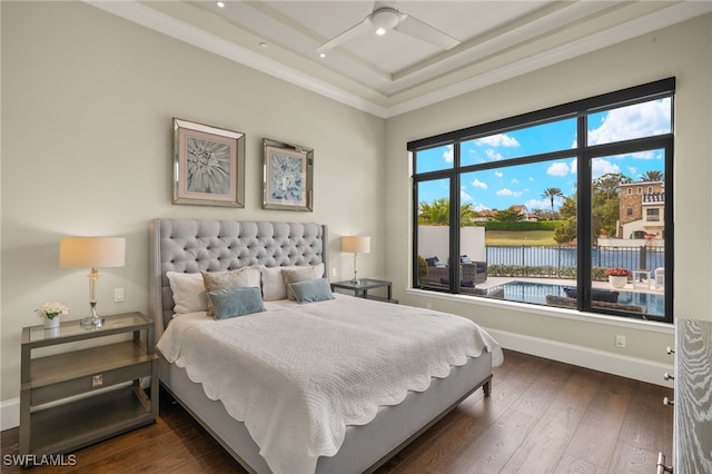 16460 Talis Park Dr, Naples, FL 34110 - bedroom with hardwood / wood-style floors, a water view, baseboards, and ornamental molding