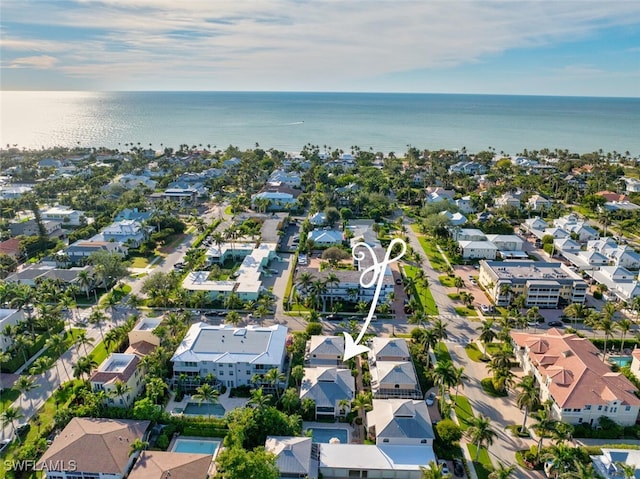 aerial view with a residential view and a water view