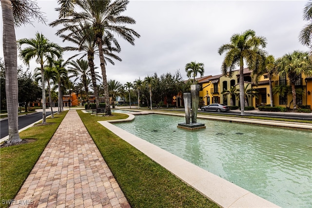 view of home's community featuring a water view