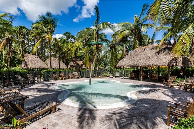 view of swimming pool with a gazebo and a patio