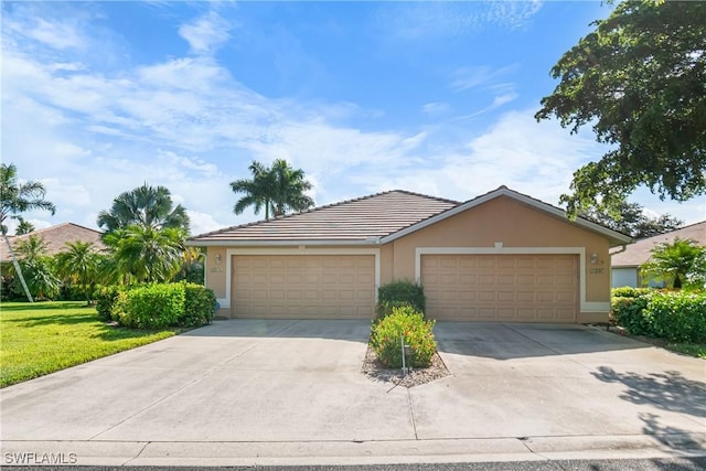 single story home featuring a garage