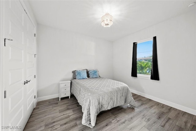 bedroom featuring hardwood / wood-style floors