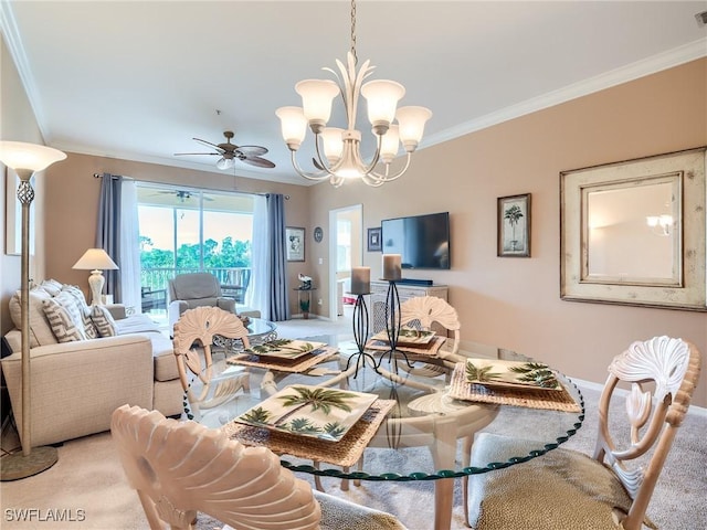 carpeted living room with ceiling fan with notable chandelier and ornamental molding