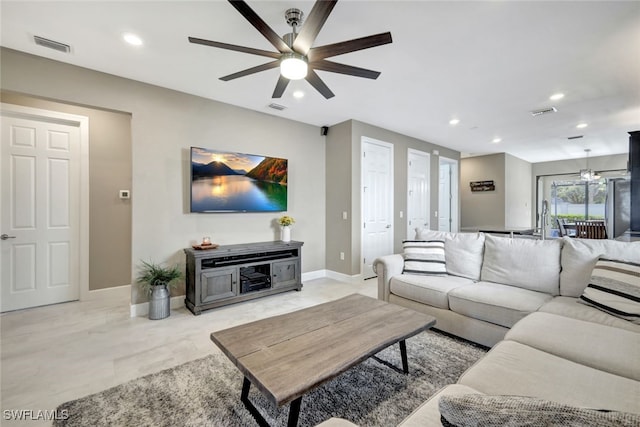 living room featuring ceiling fan