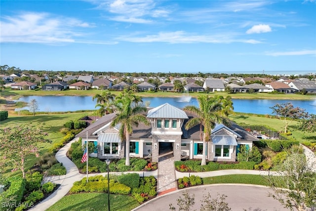 birds eye view of property featuring a water view