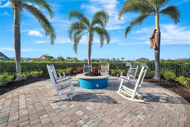 view of patio with a fire pit