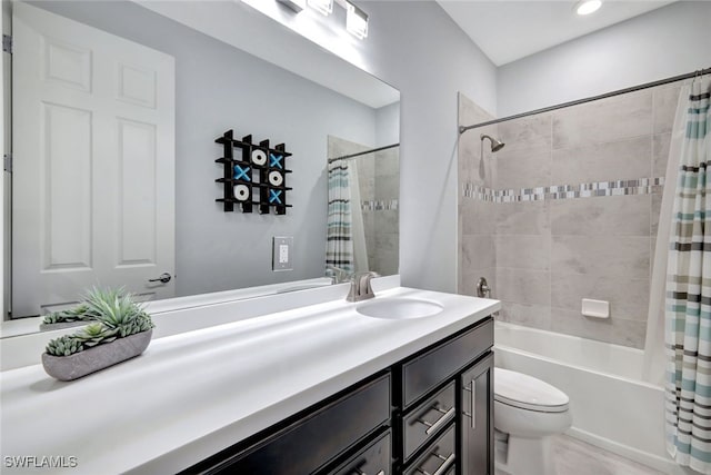 full bathroom with toilet, vanity, and shower / tub combo with curtain