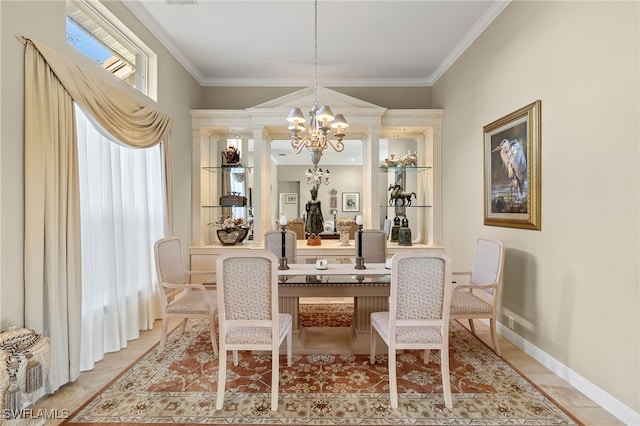 dining area with tile patterned flooring, ornamental molding, and an inviting chandelier