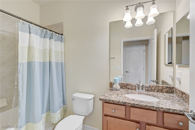 full bathroom with vanity, toilet, and shower / tub combo