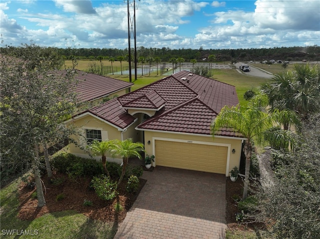 view of front of property with a garage