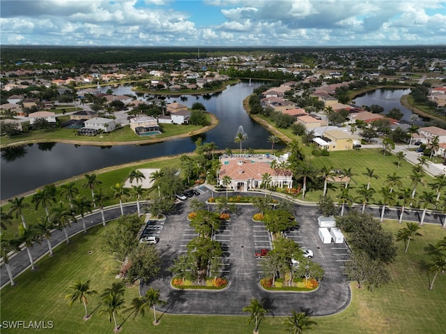 drone / aerial view with a water view