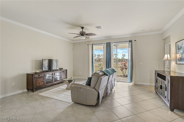 tiled living room featuring ceiling fan and crown molding