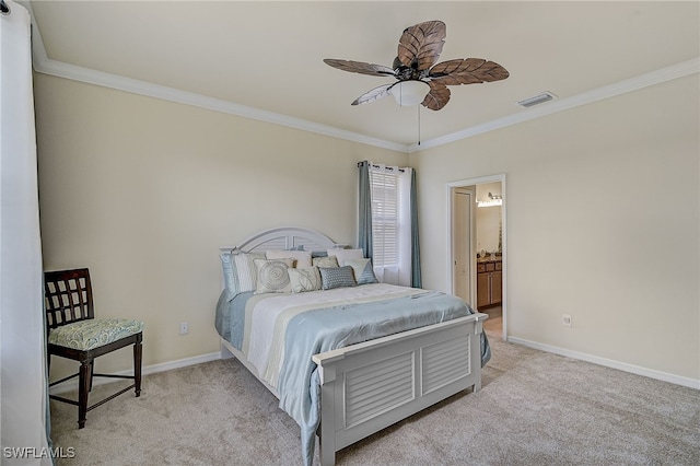 carpeted bedroom featuring ceiling fan, ornamental molding, and ensuite bathroom