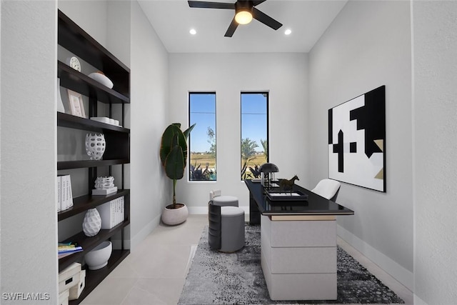 office space featuring recessed lighting, ceiling fan, and baseboards