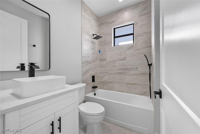 bathroom with toilet, bathtub / shower combination, and vanity