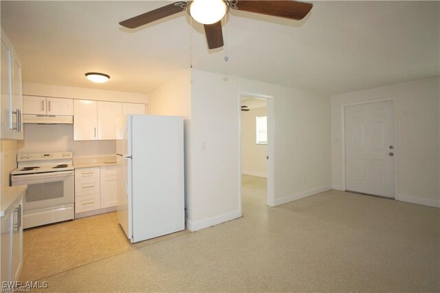 kitchen featuring white appliances, white cabinetry, and ceiling fan